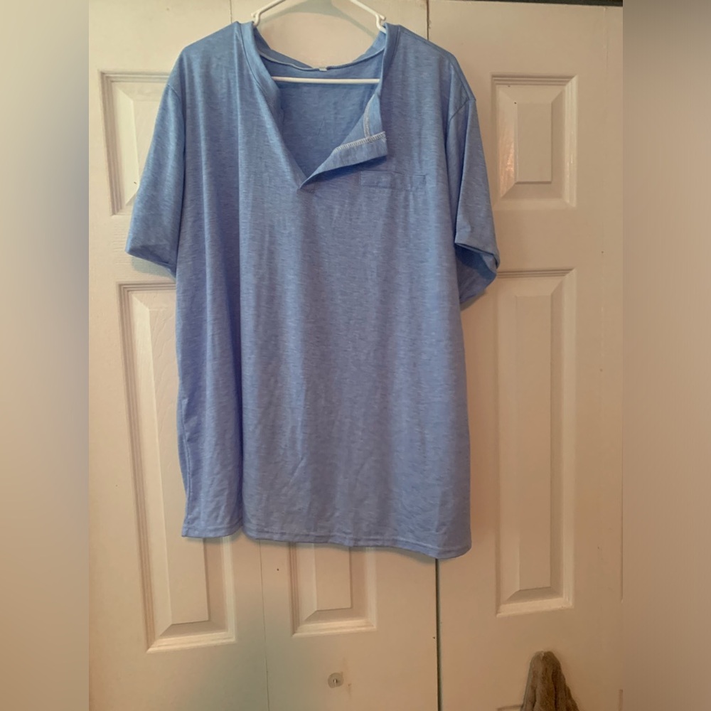 Light blue short sleeves looks like a pocket but not